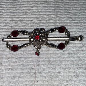 Small lrose.biz red gem hair clip